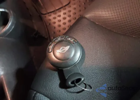 2009 Mini Cooper S z USA, uszkodzony, nr VIN WMWMS335X9TG89884